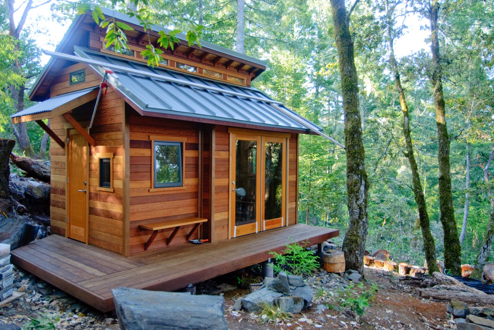 Small wooden backyard cottage / ADU nestled in a wooded lot